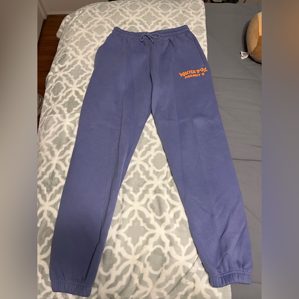 Women’s cozy sweatpants, size small, colors black and purple, brand: White Fox.